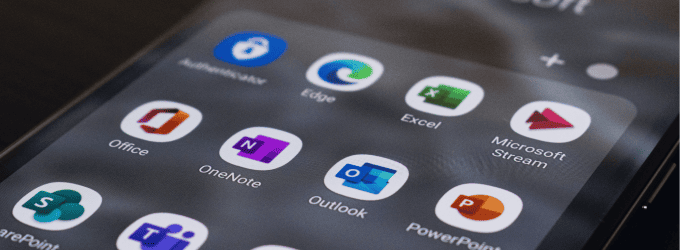 Mobile device home screen showing business productivity and collaboration apps for IT team management