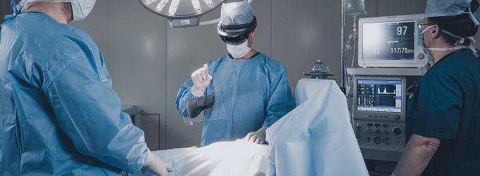 Surgical team uses connected monitoring equipment for live data tracking and precision procedures