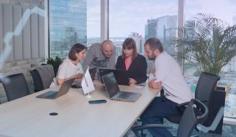 Innowise IT team working on big data and AI projects