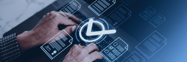IT professional working on laptop surrounded by holographic document schemas and a scheduling icon for task management
