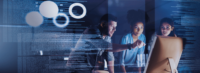 The consulting team reviews analytics on screen, focusing on data-driven IT strategy and solutions