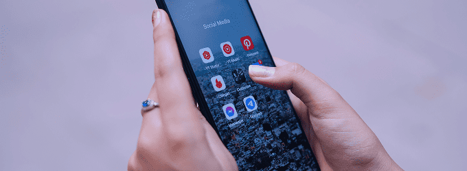 Tester verifying mobile app accessibility compliance