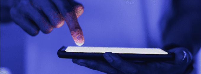 Tester interacting with a digital tablet interface for user acceptance testing