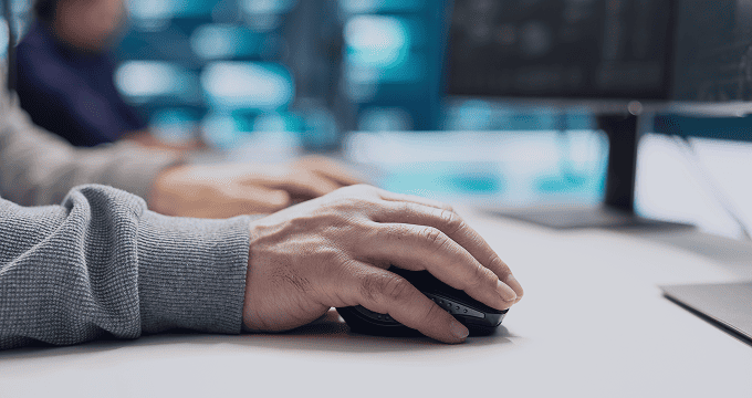 IT team member uses unified console to deploy updates and monitor system health across servers