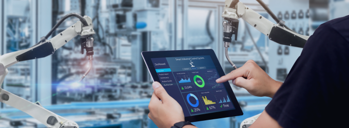Smart manufacturing team oversees robotic arms with IoT-driven control panel